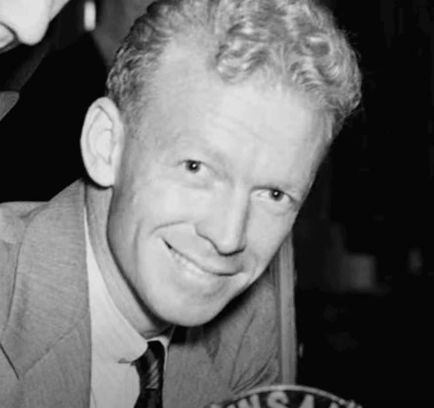 A vintage photo of Red Barber, celebrated baseball announcer, featured in "The Voices Of Baseball."